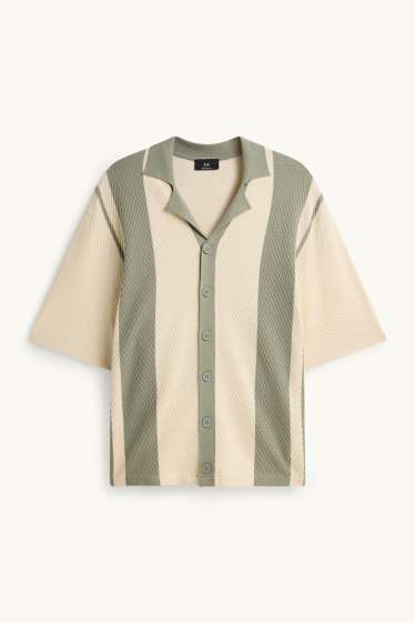 Hommes - Polo - relaxed fit - à rayures - finition texturée - vert / blanc crème