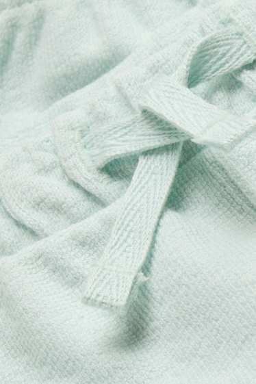 Unisex - Kalhoty pro novorozence - modrá