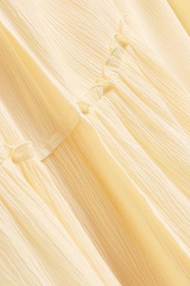 Femmes - Jupe - finition texturée - jaune