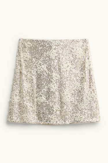 Dona - Faldilla amb lluentons - daurat