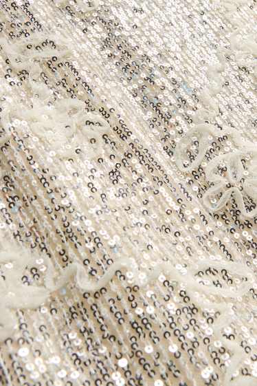 Dona - Faldilla amb lluentons - daurat