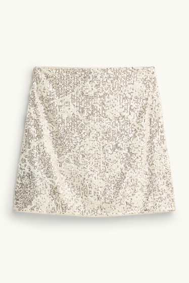 Dona - Faldilla amb lluentons - daurat