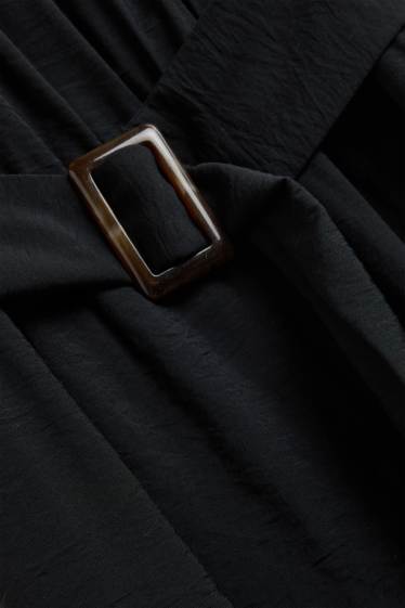 Femei - Salopetă cu curea - negru