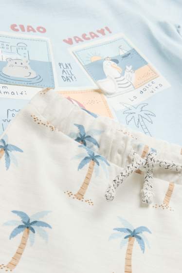 Baby: jongens - Dieren en palmbomen - babyoutfit - 2-delig - blauw