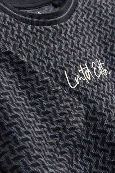 Kinder Buben - Kurzarmshirt - gemustert - schwarz