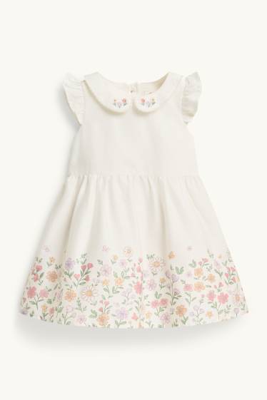 Baby: meisjes - Bloemetje - babyjurk - wit