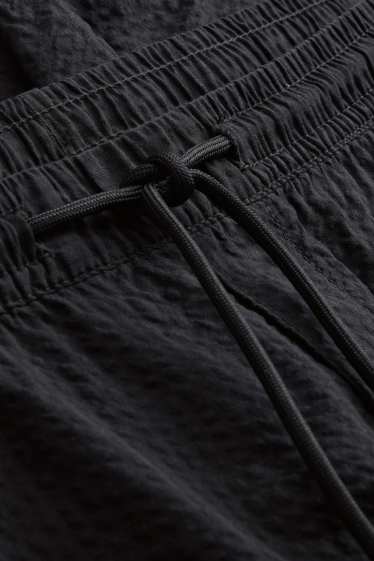 Hommes - Short - finition texturée - noir