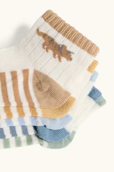 Nadó nen - Paquet de 5 - dinosaures - mitjons amb dibuix per a nadó - blau