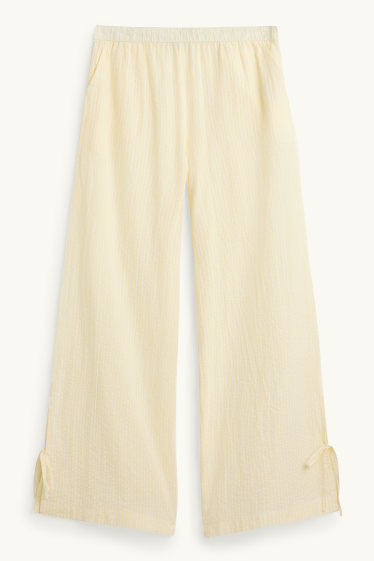 Dámské - Mušelínové plátěné kalhoty - mid waist - wide leg - pruhované - světle žlutá