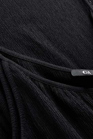 Dona - Granota amb cinturó - texturada - negre