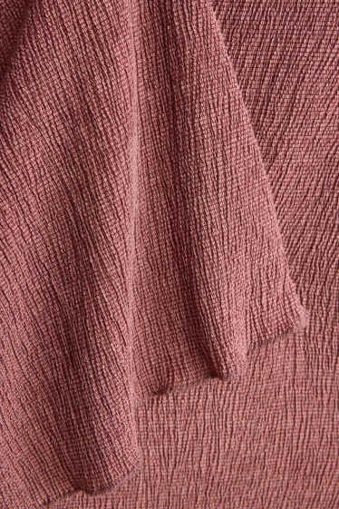 Dona - Pantalons de tela - high waist - flared - vermell