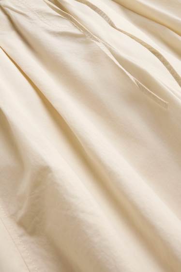 Dona - Pantalons de tela - mid waist - barrel leg - blanc trencat