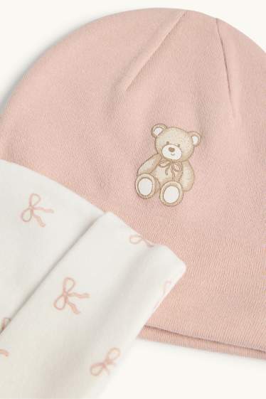 Baby: meisjes - Set van 2 - beertje en strik - babymuts - wit / roze