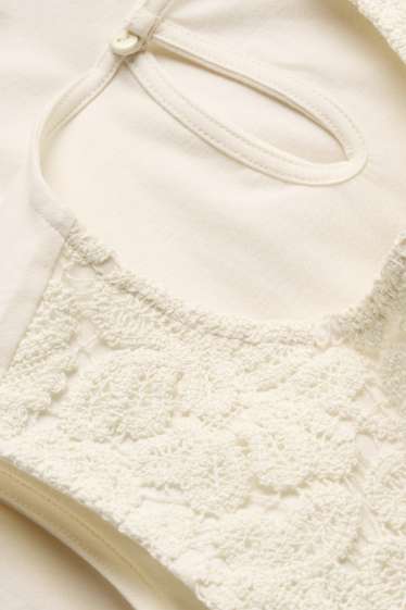 Dámské - Halenka bez rukávů - krémově bílá