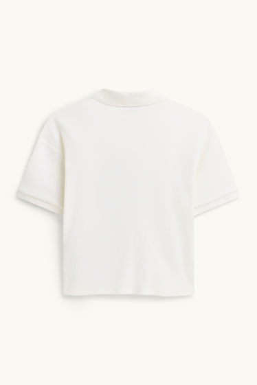 Dona - Polo - regular fit - acanalat - blanc