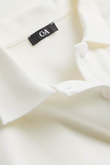 Dona - Polo - regular fit - acanalat - blanc