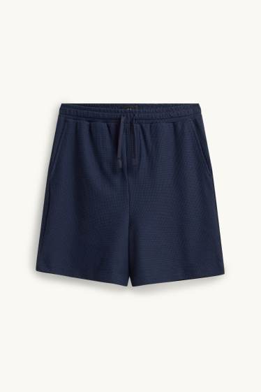 Hommes - Short en molleton - finition texturée - bleu foncé