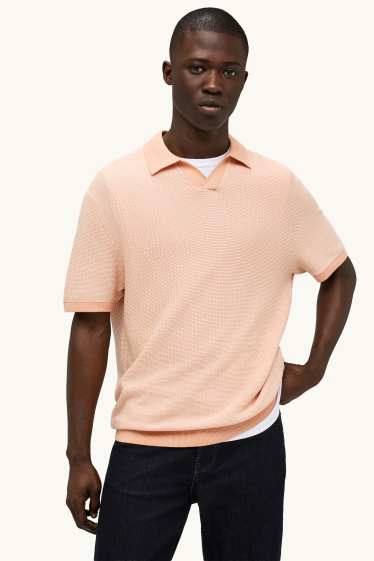 Heren - Gebreid poloshirt - relaxed fit - met structuur - oranje