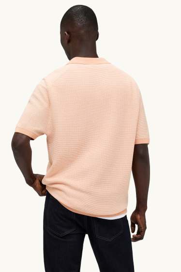 Heren - Gebreid poloshirt - relaxed fit - met structuur - oranje