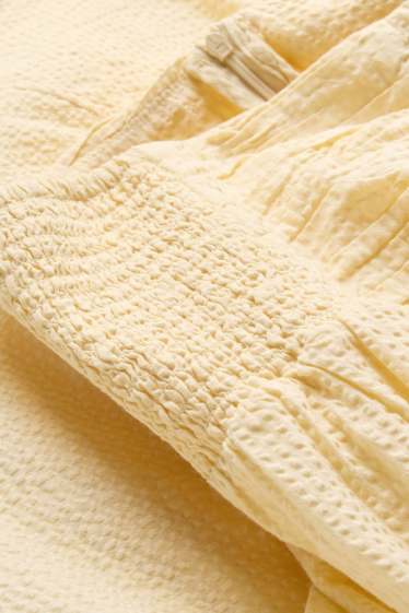 Dona - Minifaldilla - texturada - groc clar