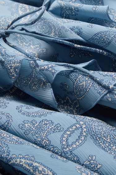 Dona - Brusa - amb motiu - blau