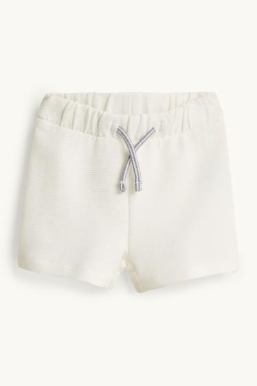 Bebeluși - băieți - Winnie de Pluș - compleu bebeluși - 2 piese - albastru / alb