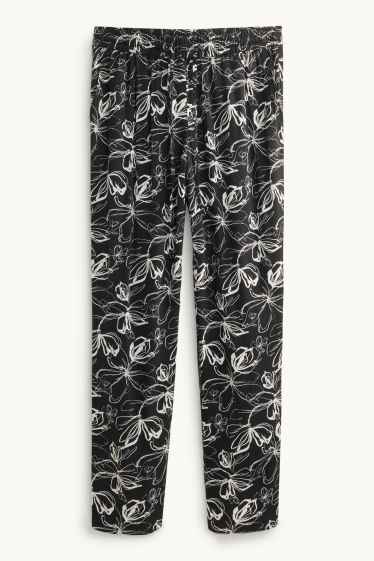 Donna - Pantaloni - vita media - tapered fit - a fiori - bianco / nero