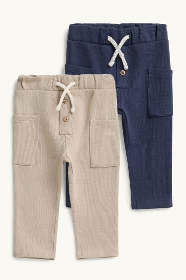 Baby: jongens - Set van 2 - babyjoggingbroek - met structuur - blauw / beige
