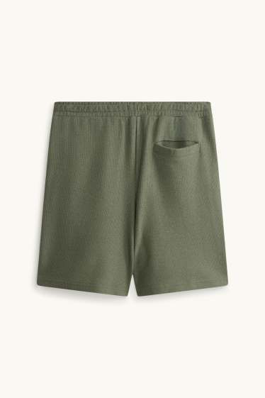 Uomo - Shorts - verde scuro