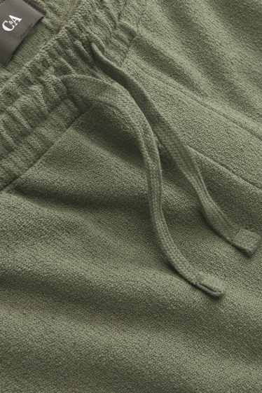 Uomo - Shorts - verde scuro