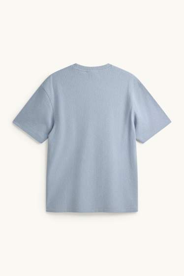 Mężczyźni - T-shirt - relaxed fit - niebieski