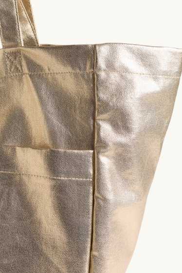 Femmes - Grand cabas - finition brillante - or