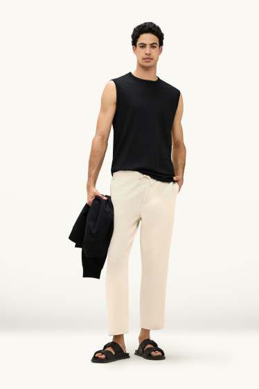 Mężczyźni - Spodnie dresowe - kremowy