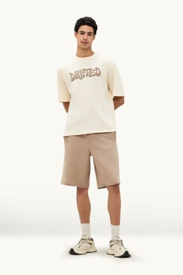 Hommes - Short en molleton - beige
