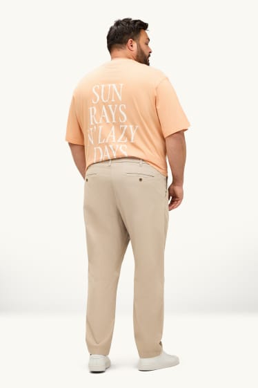 Hommes - Chino - tapered fit - finition texturée - beige clair