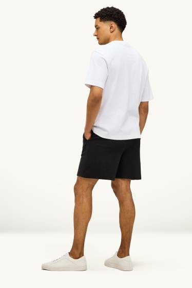 Hommes - Short en molleton - texturé - noir
