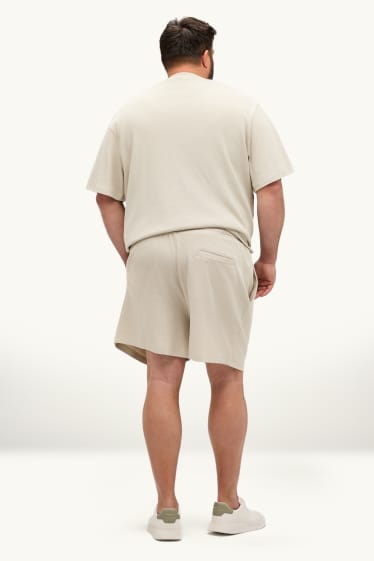 Uomo - Shorts in felpa - tessuto tramato - bianco crema