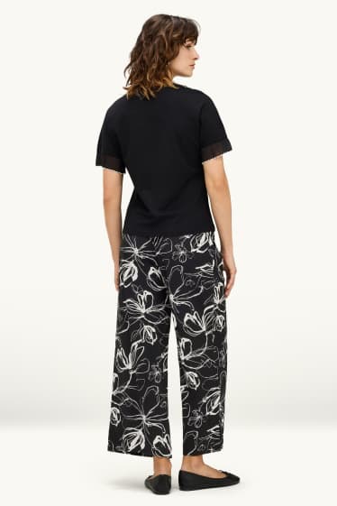 Dames - Korte pantalon - high waist - palazzo - gebloemd - wit / zwart