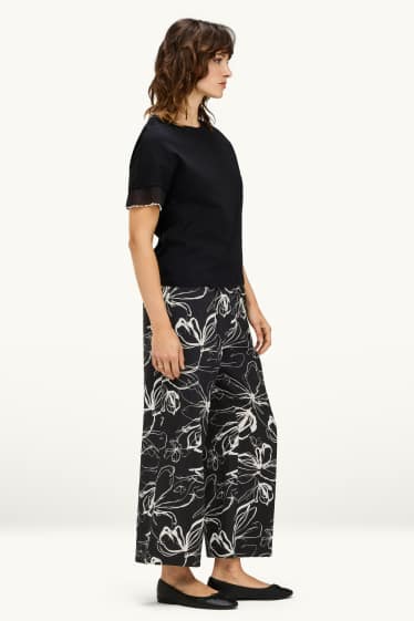 Dames - Korte pantalon - high waist - palazzo - gebloemd - wit / zwart