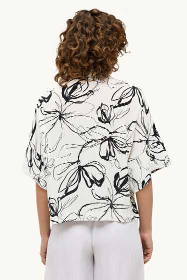 Dames - Blouse - gebloemd - wit / zwart