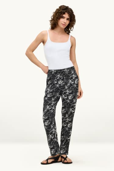 Donna - Pantaloni - vita media - tapered fit - a fiori - bianco / nero
