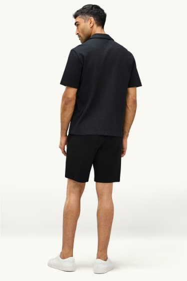 Uomo - Shorts di felpa - tessuto tramato - nero