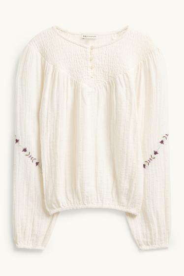 Kinderen: meisjes - Blouse van mousseline - gesmokt - crème wit