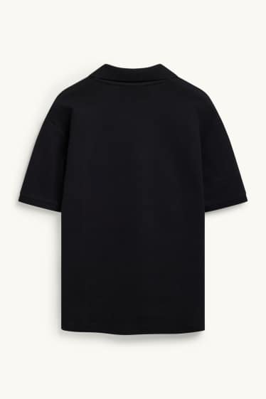 Hommes - Polo - relaxed fit - finition texturée - noir
