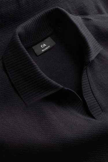 Hommes - Polo - relaxed fit - finition texturée - noir