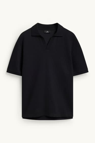 Hommes - Polo - relaxed fit - finition texturée - noir