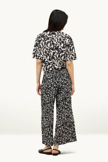 Femmes - Pantalon en toile court - mid waist - wide leg - à motif - noir / beige
