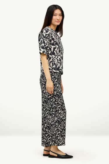 Femmes - Pantalon en toile court - mid waist - wide leg - à motif - noir / beige