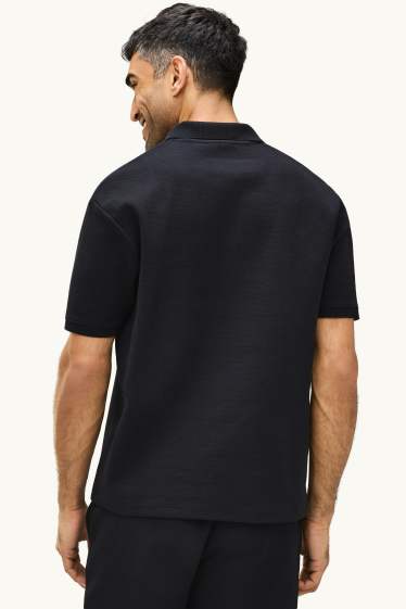 Hommes - Polo - relaxed fit - finition texturée - noir