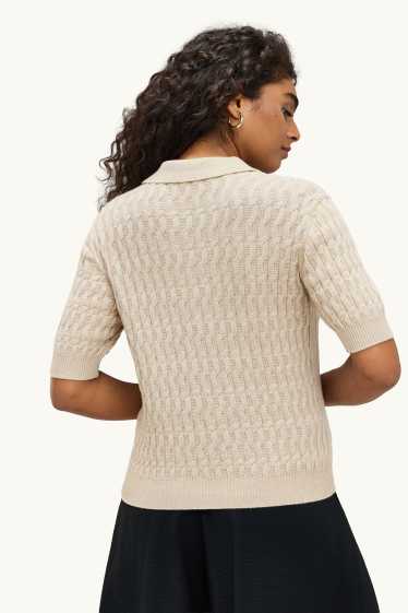Femmes - Pull en maille - manches courtes - finition texturée - beige
